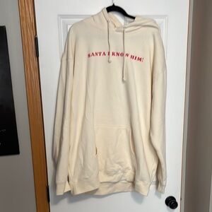 Cream Hoodie with Festive Red Text